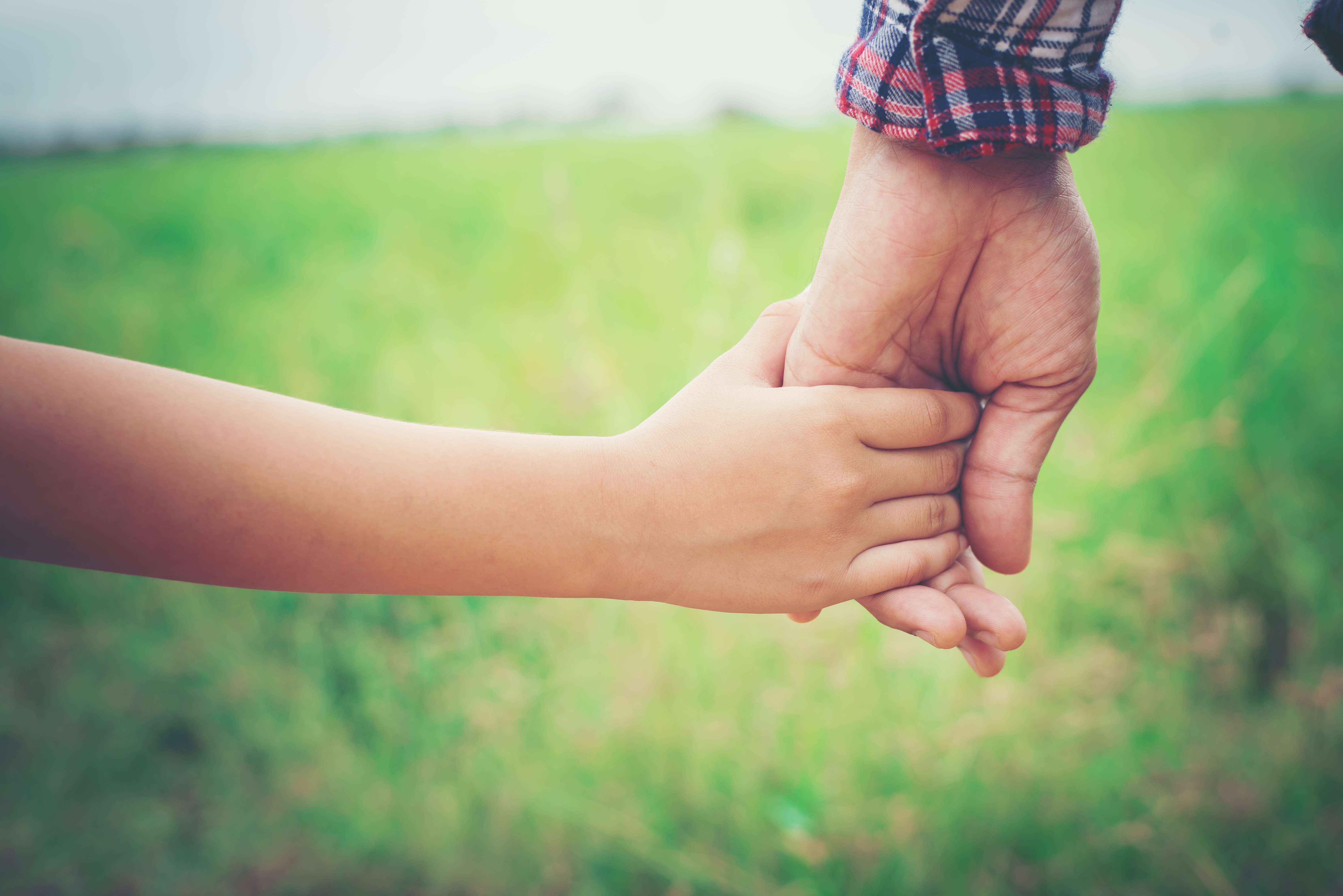 close-up-father-holding-his-daughter-hand-so-sweet-family-ti